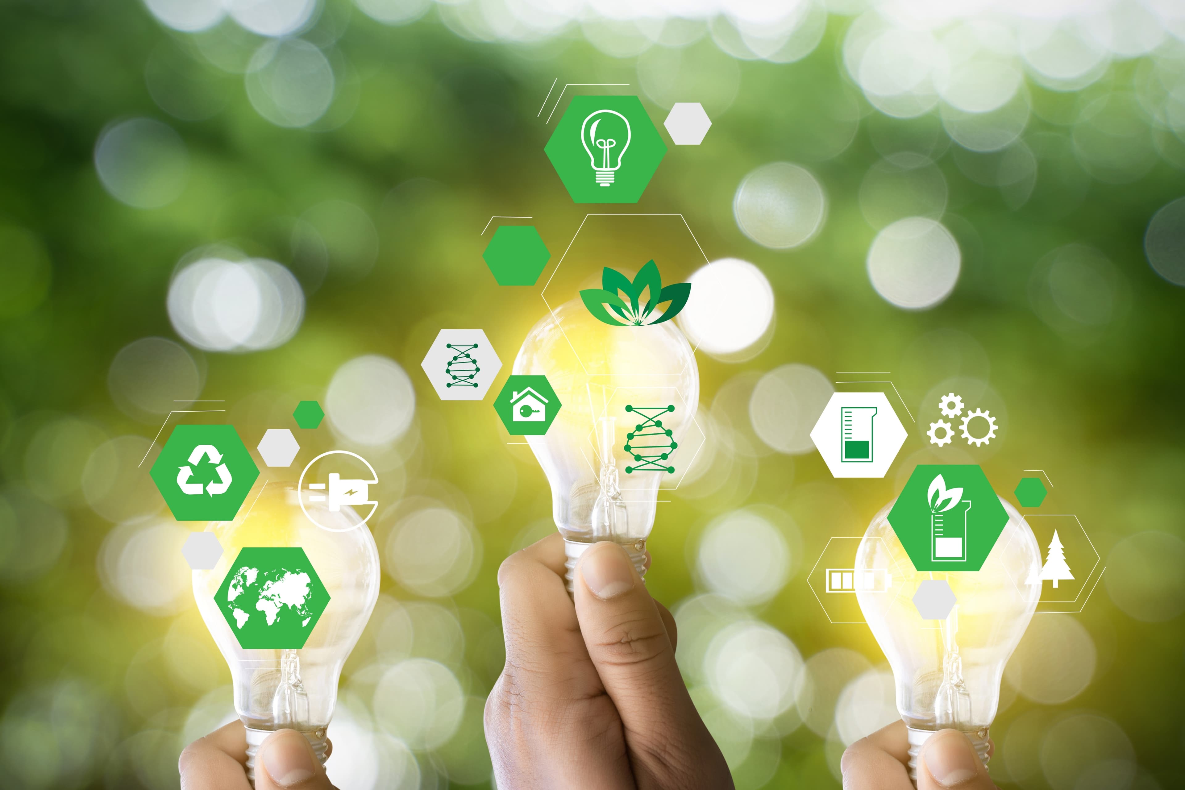 Hands Holding Green Energy Icons